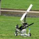 Member of the bomb squad and a bomb squad robot approach the gyrocopter (AP Photo/Andrew Harnik)